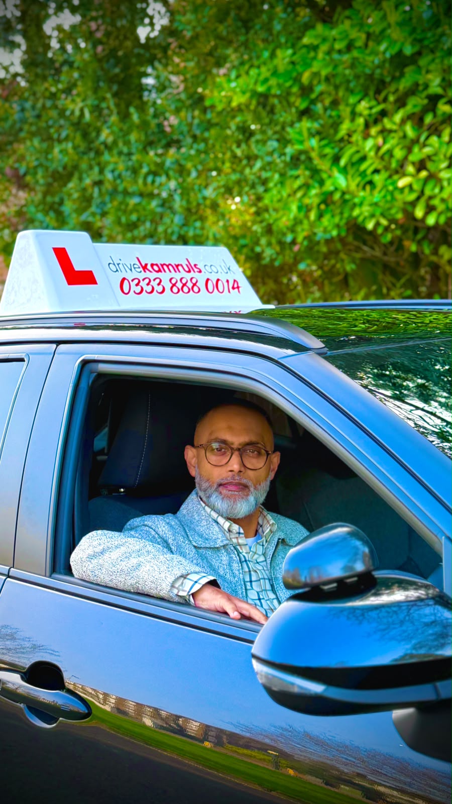 Kamrul Beaming from the Driver's Window